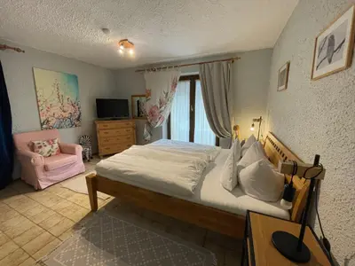 Ein Bett oder Betten in einem Zimmer der Unterkunft Apartment Achentaler FeWo inkl- Spabereich by Interhome