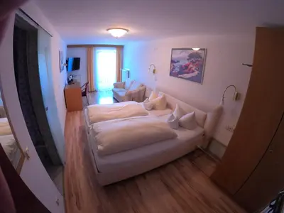 Ein Bett oder Betten in einem Zimmer der Unterkunft Hotel Bavaria