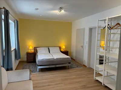 Ein Bett oder Betten in einem Zimmer der Unterkunft Huberhof Meisham