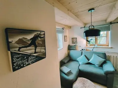 Ein Sitzbereich in der Unterkunft Ferienwohnungen Holler