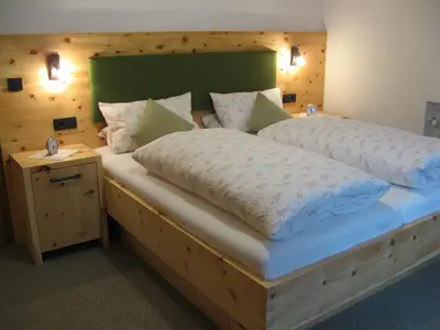 Ein Bett oder Betten in einem Zimmer der Unterkunft Haus Isartal