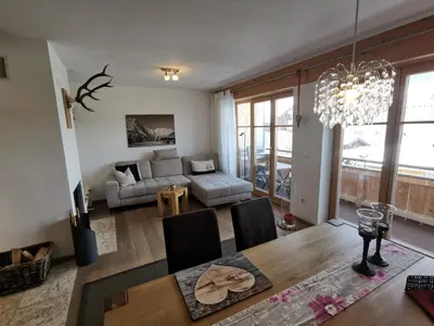 Ein Sitzbereich in der Unterkunft Ferienlandhaus Alpinum