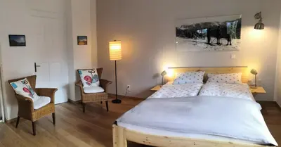 Ein Bett oder Betten in einem Zimmer der Unterkunft Haus Erika 1911 - Alpspitze