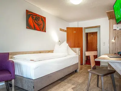 Ein Bett oder Betten in einem Zimmer der Unterkunft Gasthof Neuwirt