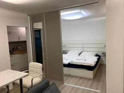 Ein Bett oder Betten in einem Zimmer der Unterkunft Great Studio