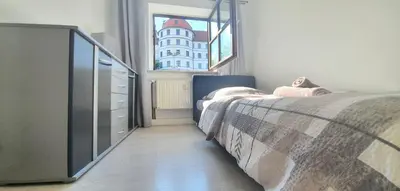 Ein Bett oder Betten in einem Zimmer der Unterkunft Neuburg Apartment am Schloss