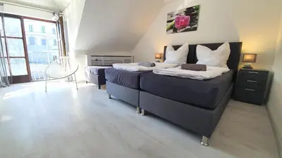 Ein Bett oder Betten in einem Zimmer der Unterkunft Neuburg Apartment am Schloss