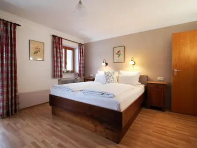 Ein Bett oder Betten in einem Zimmer der Unterkunft Beim Lenz