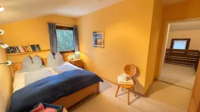 Ein Bett oder Betten in einem Zimmer der Unterkunft Ferienhaus Balsbergblick