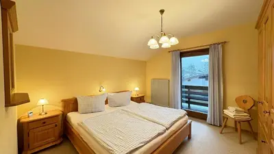 Ein Bett oder Betten in einem Zimmer der Unterkunft Ferienhaus Balsbergblick