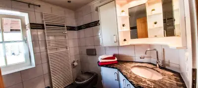 Ein Bett oder Betten in einem Zimmer der Unterkunft Ferienwohnung Reisenauer