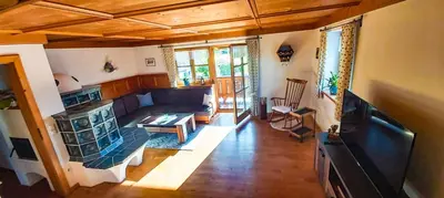 Ein Sitzbereich in der Unterkunft Ferienwohnung Reisenauer