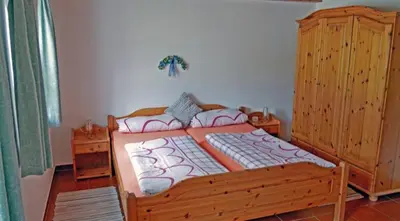 Ein Bett oder Betten in einem Zimmer der Unterkunft Gschwendtner-Hof, Ferienhof