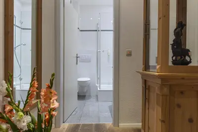 Ein Badezimmer in der Unterkunft Dom Hotel