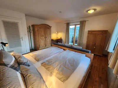 Ein Bett oder Betten in einem Zimmer der Unterkunft Haus Auracher