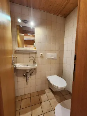 Ein Badezimmer in der Unterkunft Haus Auracher