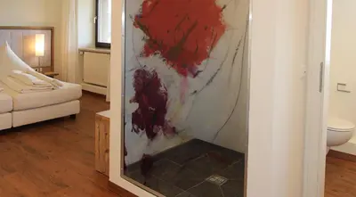Ein Bett oder Betten in einem Zimmer der Unterkunft Gasthof SONNE