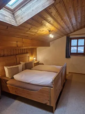 Ein Bett oder Betten in einem Zimmer der Unterkunft Huberhof, Mettenham