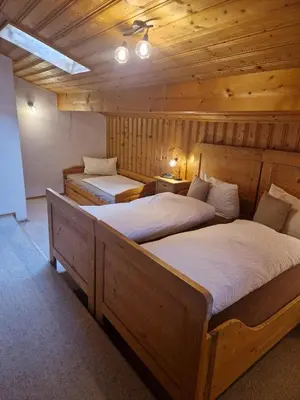 Ein Bett oder Betten in einem Zimmer der Unterkunft Huberhof, Mettenham