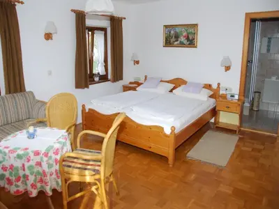 Ein Bett oder Betten in einem Zimmer der Unterkunft Gästehaus Stoanerhof