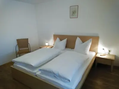 Ein Bett oder Betten in einem Zimmer der Unterkunft Ferienwohnung Rappl