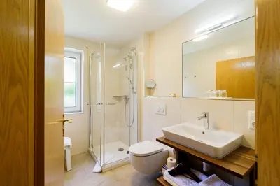 Ein Badezimmer in der Unterkunft Haus am Mühlenweg - Appartement 2 Haus I - sonniges und modernes Ferienappartement