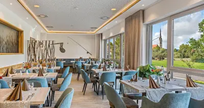 Ein Sitzbereich in der Unterkunft Hotel Seeblick
