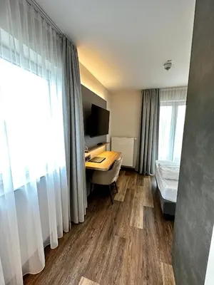 Ein Bett oder Betten in einem Zimmer der Unterkunft Hotel Seeblick