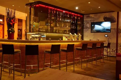Lounge oder Bar in der Unterkunft H4 Hotel München Messe