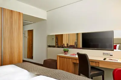 TV/Unterhaltungsangebot in der Unterkunft H4 Hotel München Messe