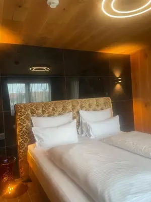 Ein Bett oder Betten in einem Zimmer der Unterkunft Hotel Fohlenhof