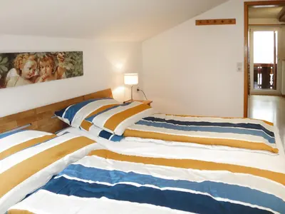 Ein Bett oder Betten in einem Zimmer der Unterkunft Apartment Fischer by Interhome
