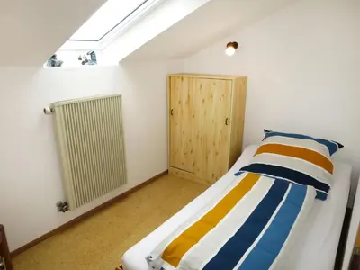 Ein Bett oder Betten in einem Zimmer der Unterkunft Apartment Fischer by Interhome