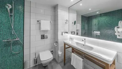 Ein Badezimmer in der Unterkunft Holiday Inn Munich - Leuchtenbergring by IHG