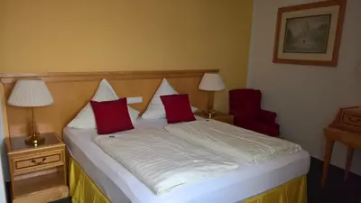 Ein Bett oder Betten in einem Zimmer der Unterkunft Gasthof Ulrich Meyer