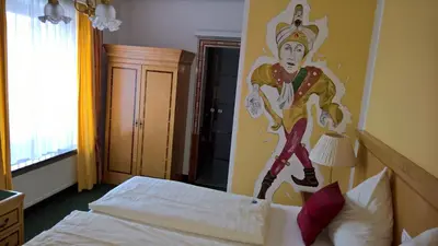 Ein Bett oder Betten in einem Zimmer der Unterkunft Gasthof Ulrich Meyer