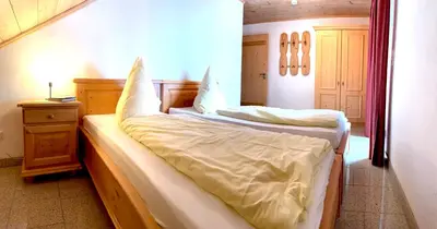 Ein Bett oder Betten in einem Zimmer der Unterkunft Almpartments Rosengasse