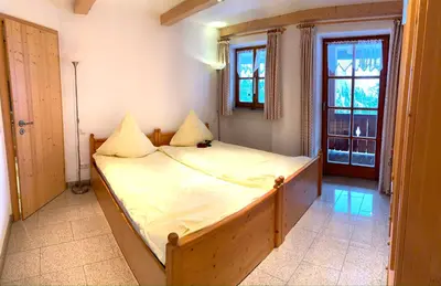 Ein Bett oder Betten in einem Zimmer der Unterkunft Almpartments Rosengasse