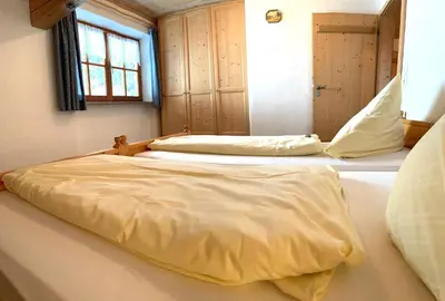 Ein Bett oder Betten in einem Zimmer der Unterkunft Almpartments Rosengasse