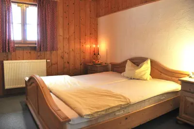 Ein Bett oder Betten in einem Zimmer der Unterkunft Almpartments Rosengasse