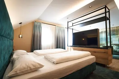 Ein Bett oder Betten in einem Zimmer der Unterkunft Hotel Restaurant Erber