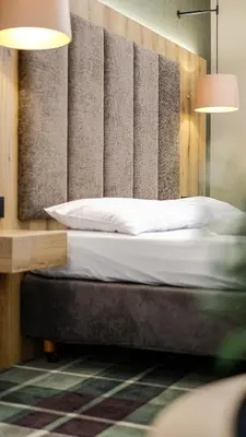 Ein Bett oder Betten in einem Zimmer der Unterkunft Hotel Restaurant Erber