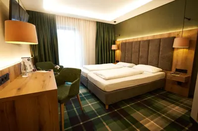 Ein Bett oder Betten in einem Zimmer der Unterkunft Hotel Restaurant Erber