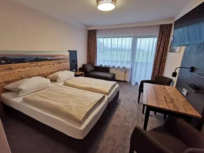 Ein Bett oder Betten in einem Zimmer der Unterkunft Haus Waldesruh