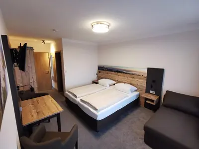 Ein Bett oder Betten in einem Zimmer der Unterkunft Haus Waldesruh