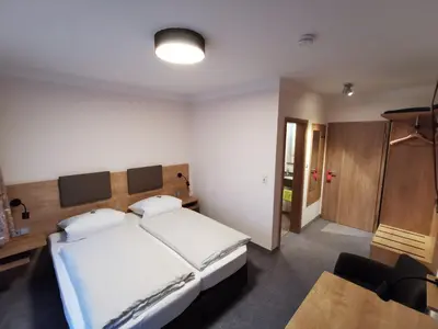 Ein Bett oder Betten in einem Zimmer der Unterkunft Haus Waldesruh