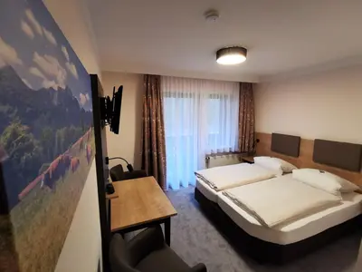 Ein Bett oder Betten in einem Zimmer der Unterkunft Haus Waldesruh