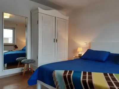 Ein Bett oder Betten in einem Zimmer der Unterkunft Apartment Gästehaus Maria