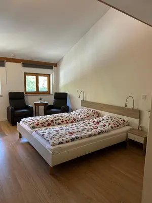 Ein Bett oder Betten in einem Zimmer der Unterkunft Manthaler