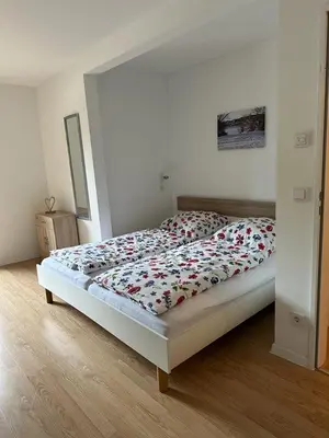 Ein Bett oder Betten in einem Zimmer der Unterkunft Manthaler